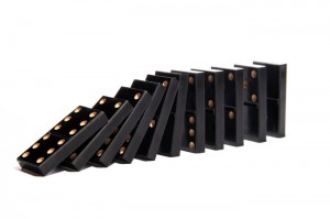 Dominoes stacked on top of each other on a white background in Asheville.